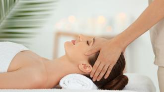 beautiful-young-woman-enjoying-massage-spa-
